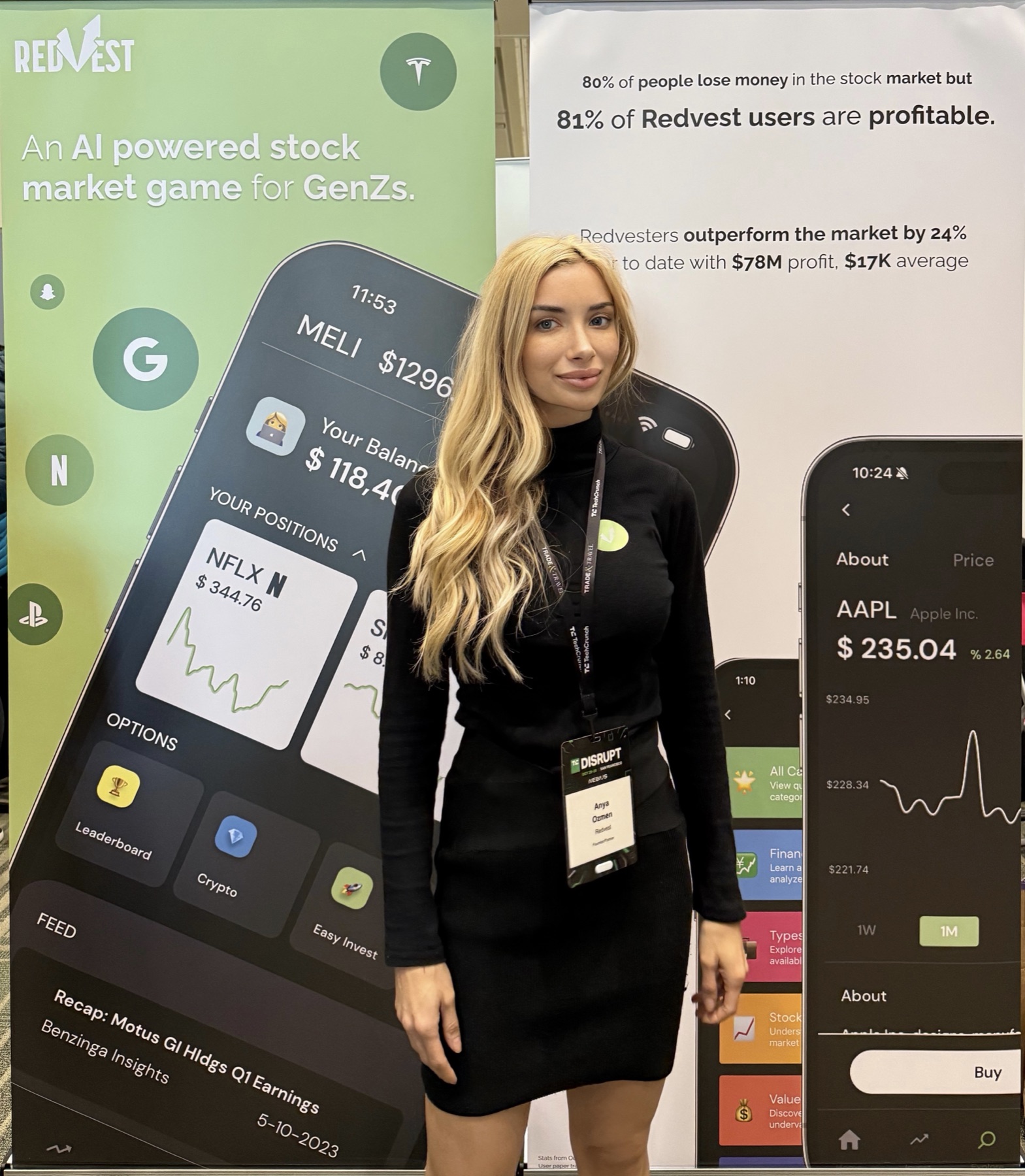 Redvest founder Anya Ozmen beside the Redvest stock market game display at TechCrunch Disrupt
