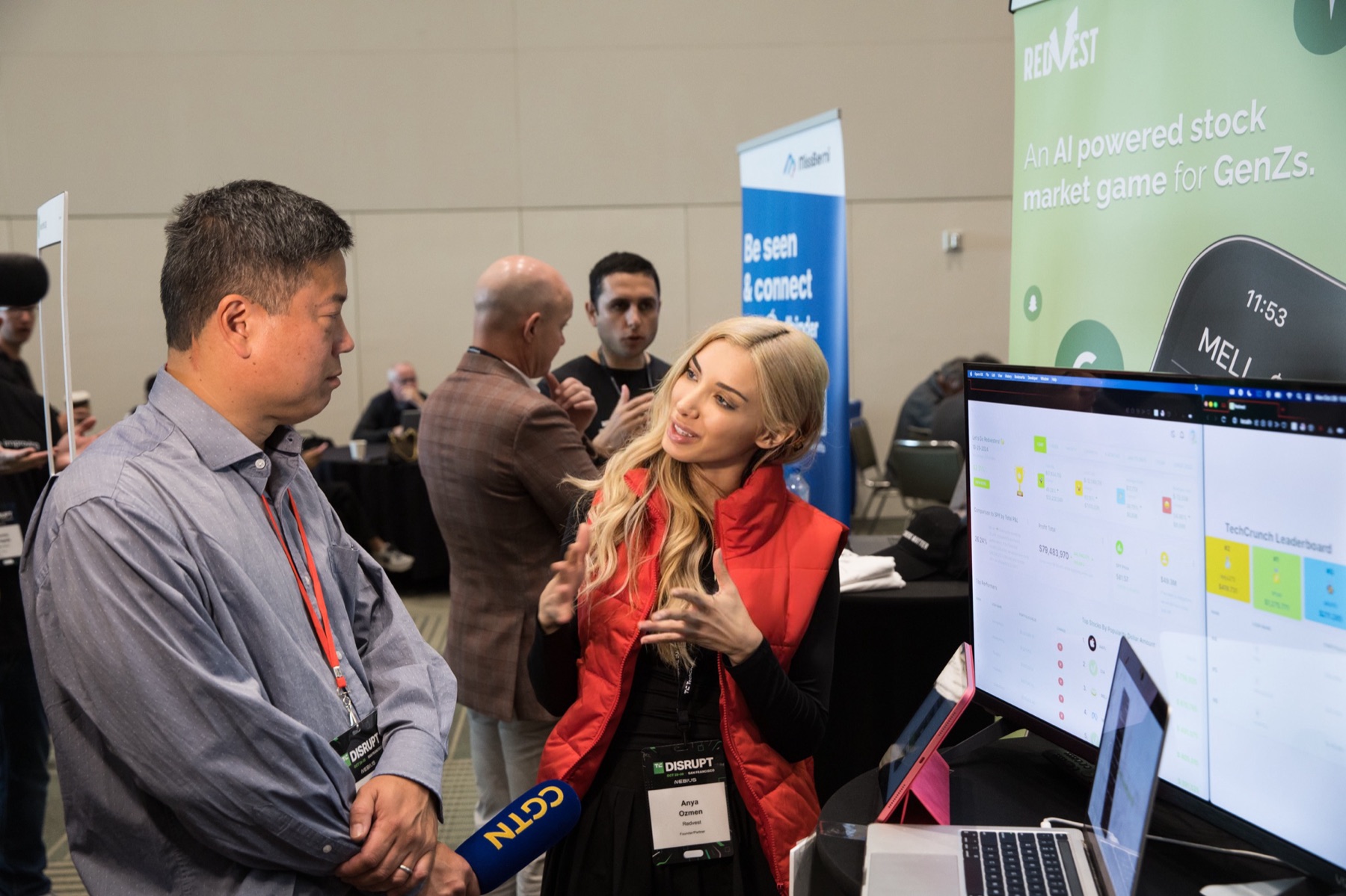 Anya Ozmen explaining the Redvest stock market game dashboard during a TechCrunch Disrupt interview