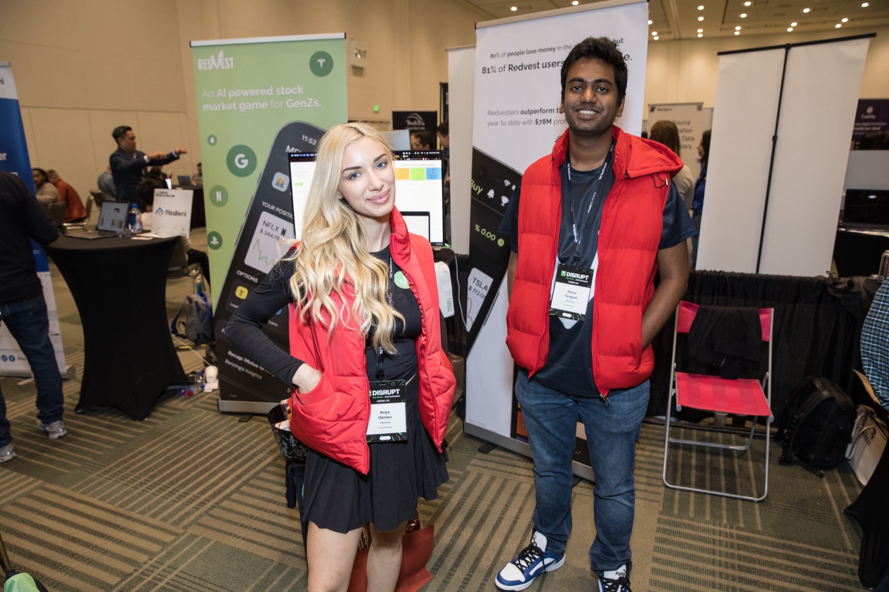 Redvest team members Anya Ozmen and Rahul Thengal at the TechCrunch Disrupt exhibit